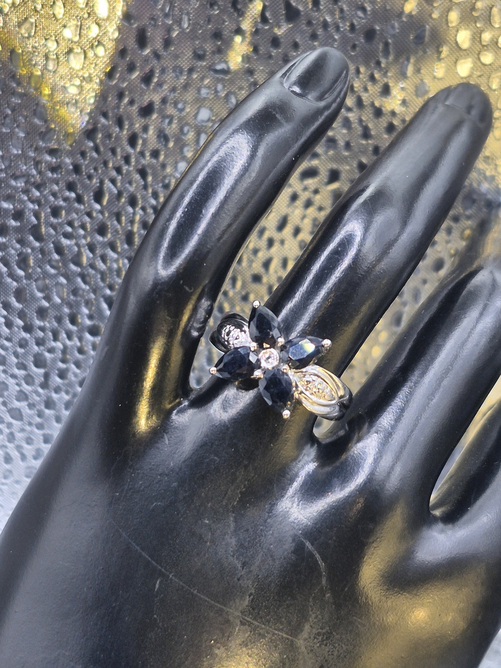 Floral Blue Sapphires And Sparkling White Topaz Accent Ring